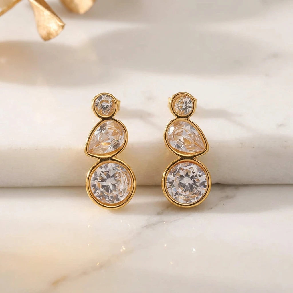 Brincos Scintilla dourados com três zircónias, foto 3