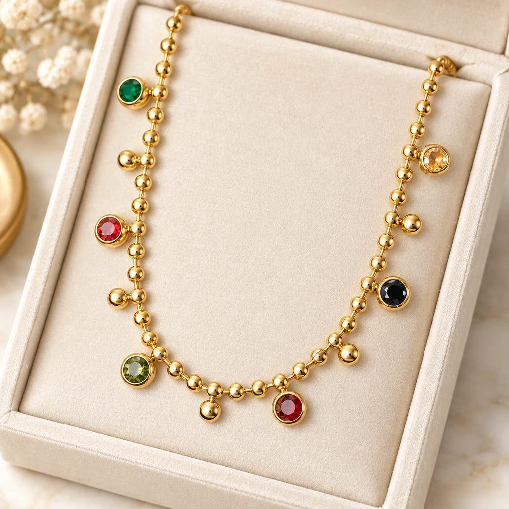 Colar Gioia dourado de contas com pendentes de zircónias coloridas
